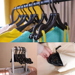 Collection of 10 portable folding hangers suitable for adult and children's clothing.