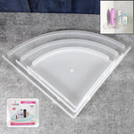 Three-piece white plastic corner shelf set displayed in a modern bathroom.