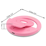 Detailed view of the LED bulbs on the selfie ring light for optimal illumination.
