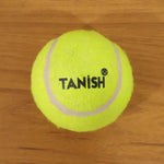 Tennis ball with bright color for easy visibility during outdoor games