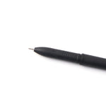 Durable plastic body of a refillable black marker pen for extended writing sessions