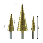 Detail of the hexagonal shank on a titanium-coated HSS steel step drill bit for secure grip.