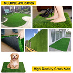 The weather-resistant artificial grass mat creating a cozy green corner on a balcony.