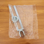 Multipurpose organizer hanging from kitchen sink faucet