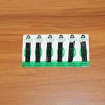 Black hair pins laid out for easy access during hair styling