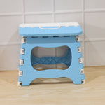 Top surface of a plastic utility stool