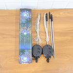 Festive outdoor setup showcasing solar warm white starburst garden lights