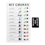 White 'MY CHORES' checklist board with colorful chore icons and a separate black magnetic piece with white dots.