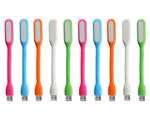 Ten flexible USB LED lamps in various colors including pink, blue, orange, white, and green arranged in a row.