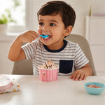 Plastic dessert spoon used by child