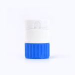 A white and blue pill crusher and cutter standing upright on a plain white background.