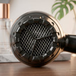 Close-up of the hair dryer highlighting its key features.