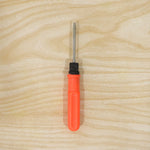 Live product shot of 2 in 1 screwdriver on wood surface