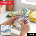A child's hands use a blue and yellow plastic clip to seal a silver chip bag, with other chip bags in the background. A red