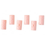 Six pink plastic bed sheet clips with a 'Love' design are arranged on a plain white background.