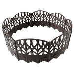Plastic decorative garden fence border on white background