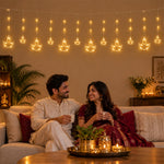 Warm white diya curtain light used for indoor festive decoration
