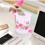 Compact plastic desk dustbin with hands-free pedal, ideal for offices and homes.