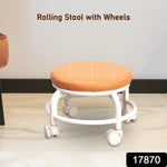 Multifunctional plastic rolling stool used for a low-level task.