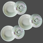 Premium 32-piece plastic dinnerware set arranged on a table.