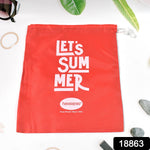 A red drawstring bag with "LET'S SUMMER" and Havaianas logo, on a white surface with green leaves and small grey stones.