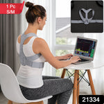 Woman wearing a grey posture corrector working on a laptop, with text overlays indicating size S/M and product number 21334.