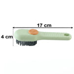 A light green and orange liquid-dispensing brush with dark bristles is shown with dimensions of 17 cm length and 4 cm height.
