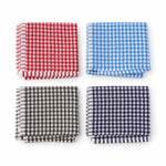 Four kitchen towels on a white background