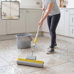 Sponge floor mop with telescopic handle usage view