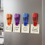 Refrigerator magnetic note clips in use