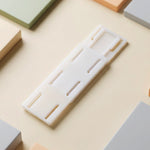 Plastic sliding retainer clip close view