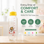 A clear glass baby bottle with a yellow nipple and monkey design stands next to text highlighting its features.