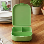 Compact medicine storage case with flip lid on a clean surface.