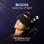 A man sleeps in a chair wearing a black eye mask, with text stating "BLOCKS every ray of light" and "100% Blackout without