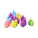 Ten colourful thumbs-up shaped adhesive clips, including pink, blue, yellow, purple, and green, arranged on a white