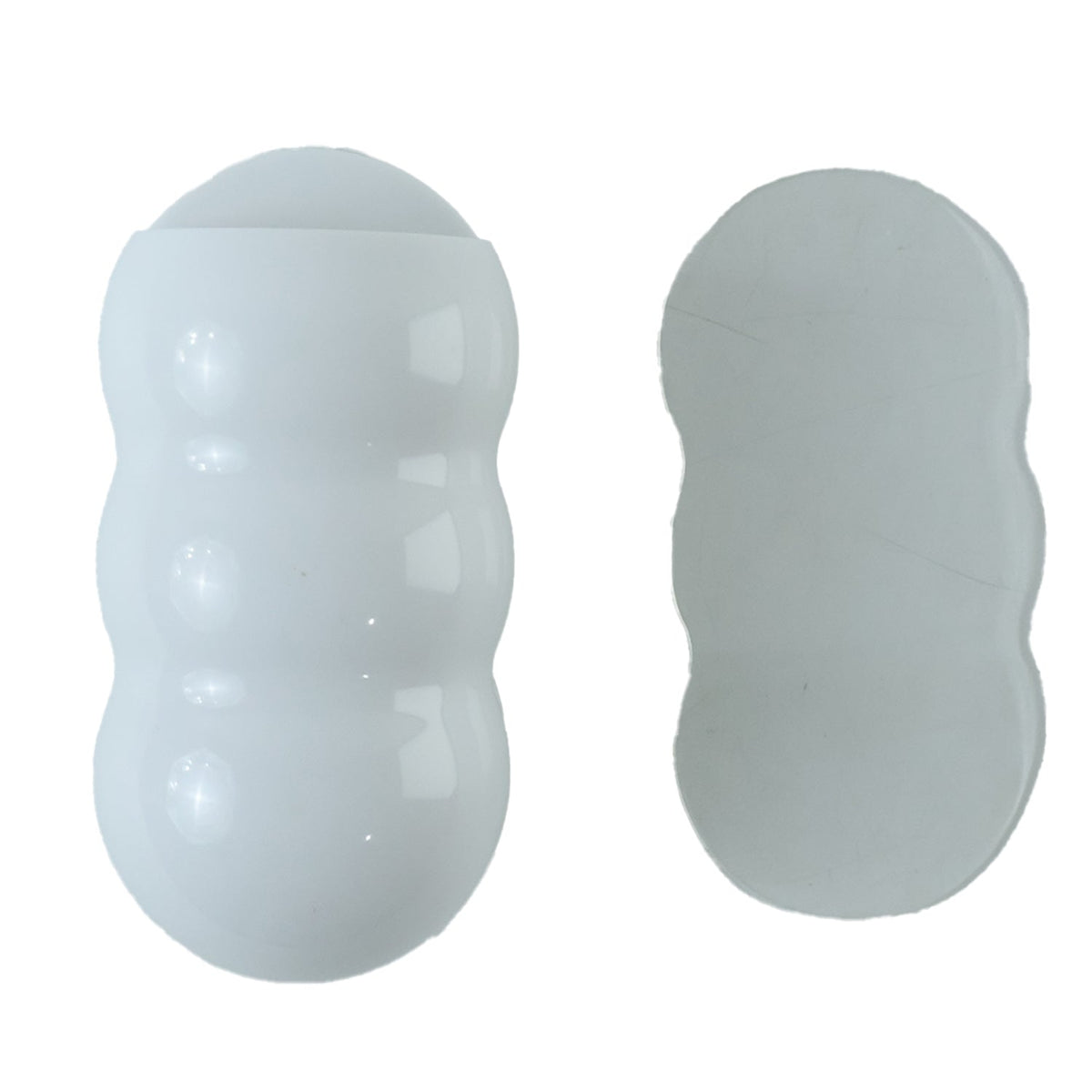 White, caterpillar-shaped holder and a clear adhesive strip on a white background.