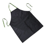 A black apron with green ties is angled on a white background.