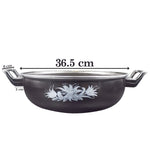 Side angle of cast iron kadai with sturdy handle for safe handling