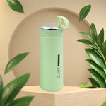 Close-up of glass water bottle 400ml leakproof bamboo lid in light green
