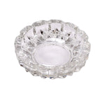 Versatile glass ashtray with multiple slots, suitable for both cigars and cigarettes.