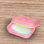 Side view of the star-shaped soap dish, highlighting its compact size.