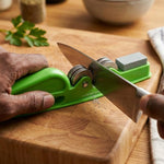 Handheld blade sharpening tool for kitchen knives