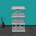 Fully assembled 4-layer foldable shoe rack with various shoes for entryway organization.