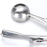 Wide head of the multi-purpose stainless steel scooper for easy portioning.