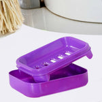 A stylish covered soap case placed on a modern bathroom countertop.