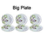 High-quality 32-piece plastic tableware set displayed on a table.