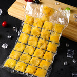 Multiple self-sealing disposable ice cube bags being filled with water for freezing.