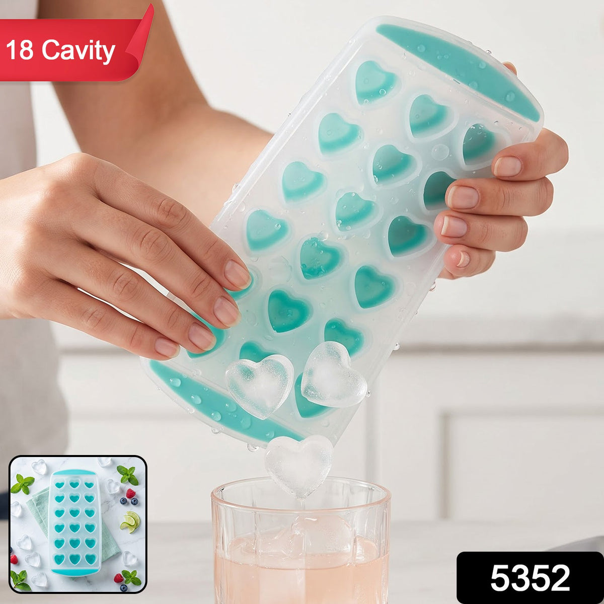 A person's hands gently twist a clear and teal heart-shaped ice cube tray, releasing two heart-shaped ice cubes – view 2