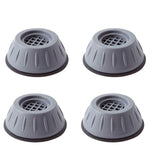 Four washer dryer vibration pads placed on floor surface