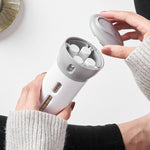 Overhead view of the refillable travel bottles set, highlighting its portability.